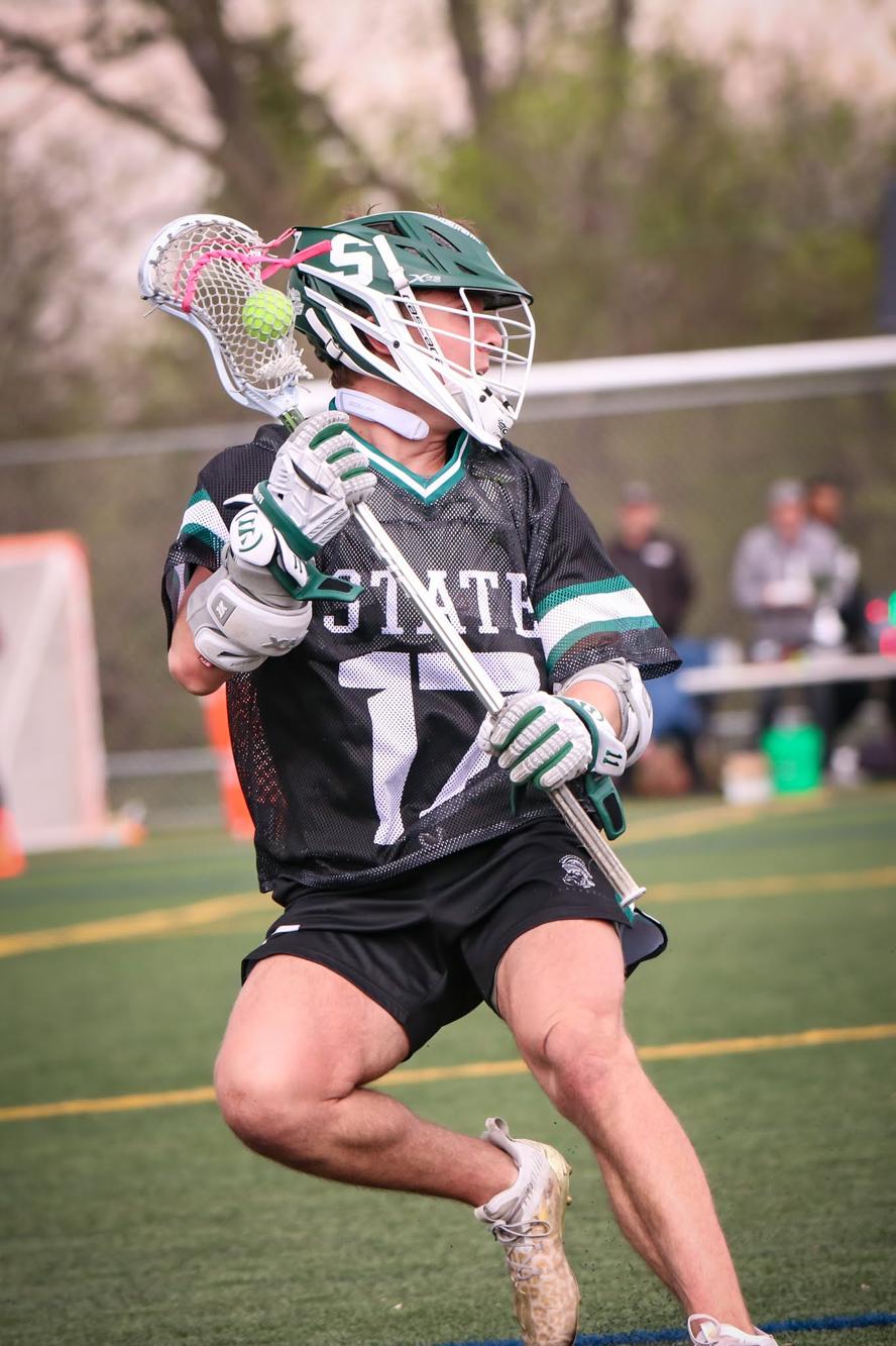 MSU attackman winding up to shoot