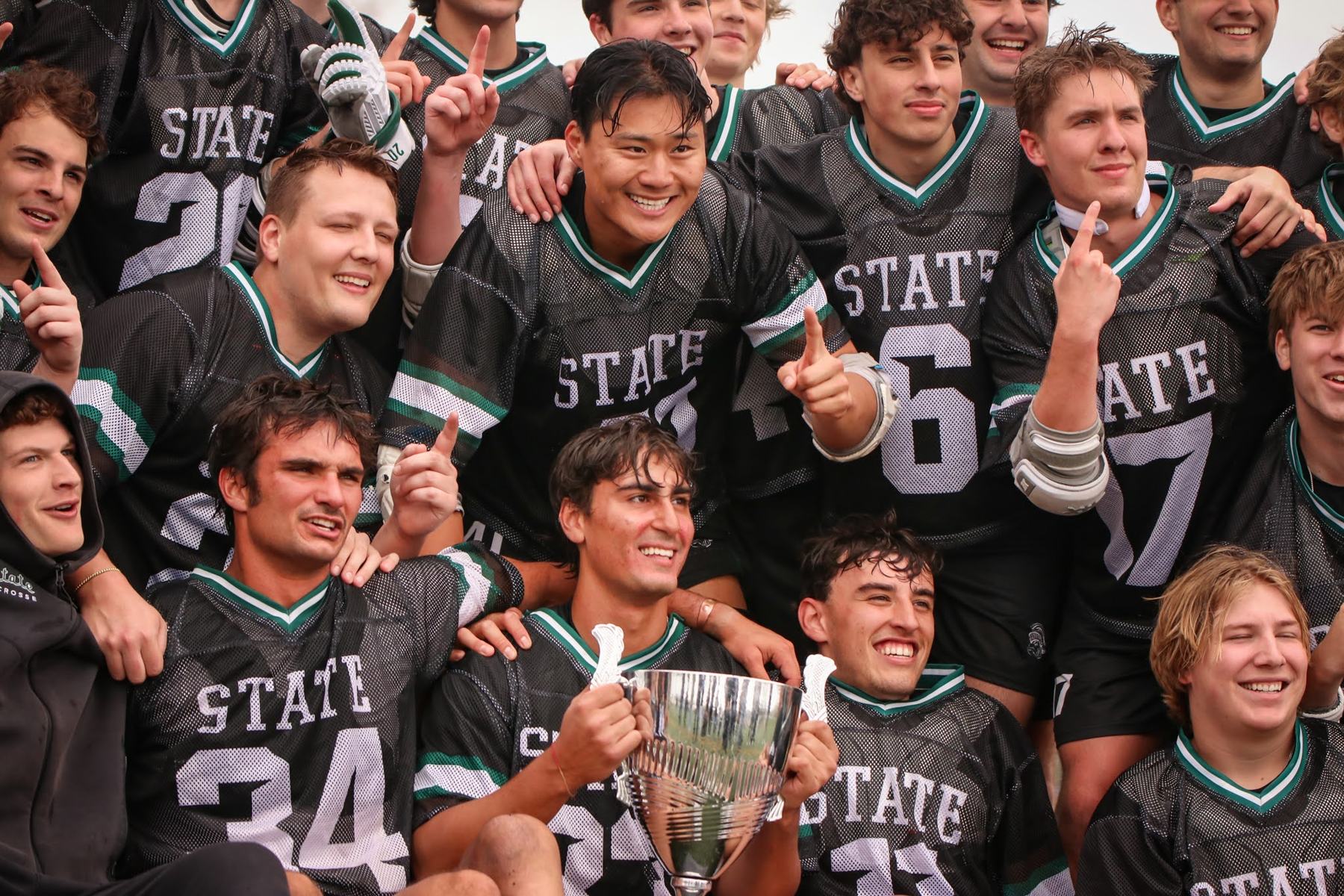 The 2026 Spartans celebrating with the conference trophy